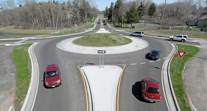 Cars driving through a roundabout 
