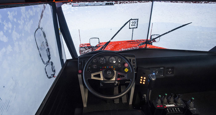 View from behind the steering wheel of the snowplow simulator