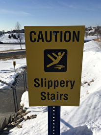 slippery steps sign