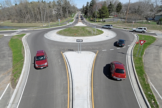 Cars driving in a roundabout 