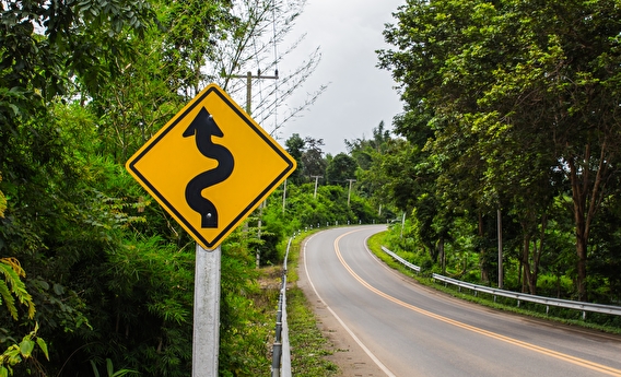 curve road ahead sign