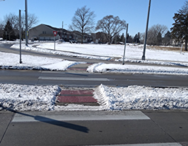 Sidewalk cleared of snow