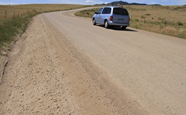 van on dirt road